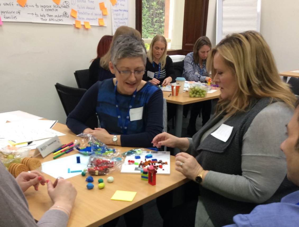 Two women working together in a workshop